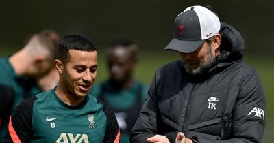 Liverpool striker misses training as Mohamed Salah pictured after contract interview