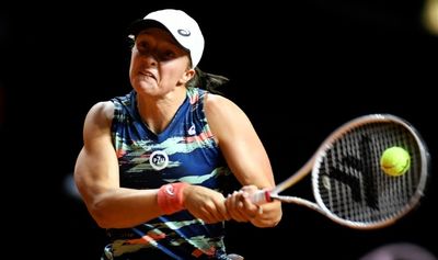 Swiatek powers past Raducanu for 21st successive win and into Stuttgart semis