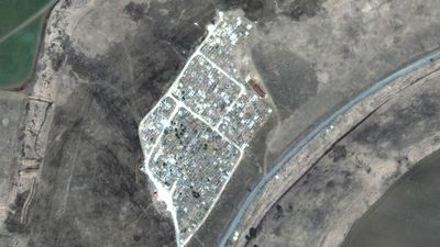 Satellite images reveal another mass grave site near Mariupol
