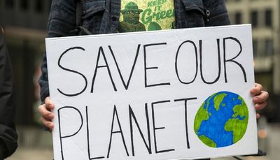 Climate change protesters gather at Federal Plaza in honor of Earth Day