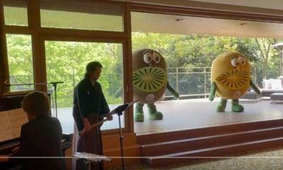 Jacinda Ardern greeted by giant sad dancing kiwifruit during visit to Japan