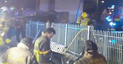 Two men seriously injured and four others hospitalised after house fire in Dublin as gardai launch probe