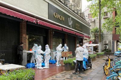 Shanghai's economy slows as COVID deals blow to industry, retail