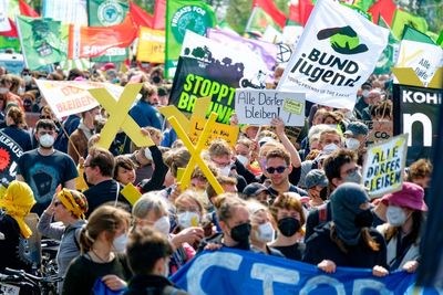 Thousands protest plan to raze German village for coal mine