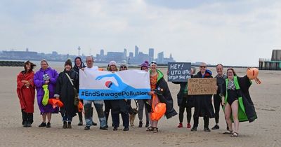 Protesters gather on New Brighton beach against sewage pollution