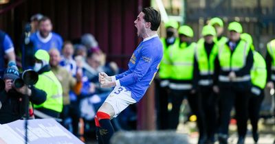 Ten-man Rangers dig deep to see off Motherwell and keep faint Premiership title hopes alive