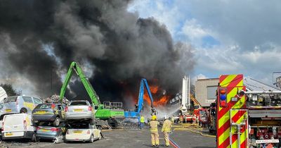 Huge industrial fire seen for miles as '200 cars' up in flames