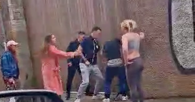 Violent Edinburgh brawl sparks police probe as woman screams 'you were f***ing due it'