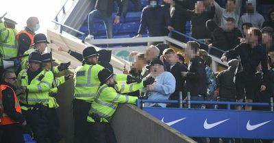 Birmingham and Millwall fans clash in ugly scenes involving weapons as six arrests made