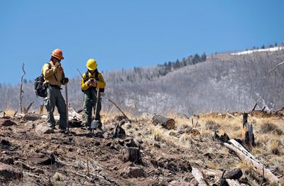 Wildfires sweep through west and southwest US amid ‘dangerously’ early fire season