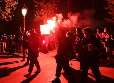 Police teargas Paris protestors after Macron re-elected