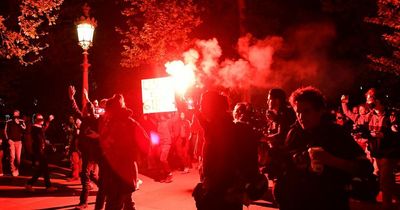 Riot police charge crowds as protesters take to streets after Macron win