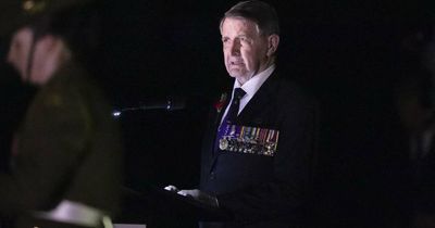 Thousands gather in a different setting among trees for Canberra's Anzac Dawn Service