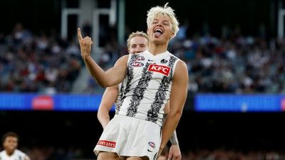Collingwood prevails against Essendon in gripping Anzac Day AFL blockbuster at MCG