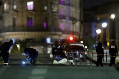 Police fire on car in central Paris, killing two people - media