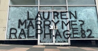 Giant mystery marriage proposal from '82-year-old Ralph' painted on empty shop window