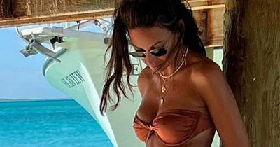 Michelle Keegan drives fans wild with sensational bikini shot as she paddles in the sea