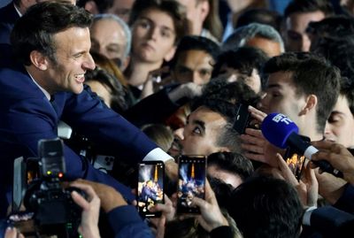 Macron seeks to heal French divisions after re-election