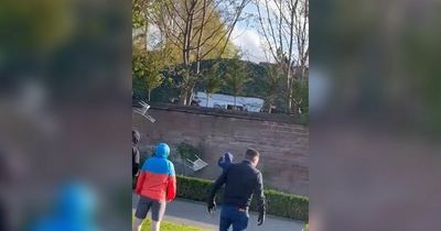 Two men bitten by police dog as fights break out after Liverpool and Everton match