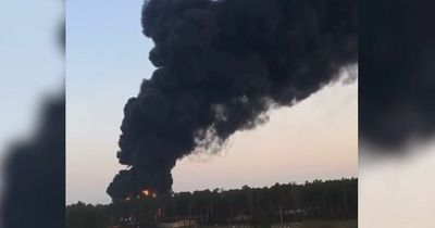 Huge fire at Russian oil depot and army base amid suspected strike by Ukraine