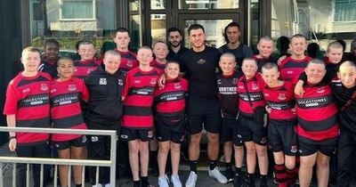 The heartwarming reason why every member of this young rugby team shaved their heads