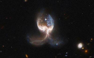 NASA telescope spots colliding galaxies shaped like ‘angel wings’ in deep space