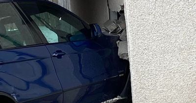 Car ploughs into side of Scots home as emergency services race to scene