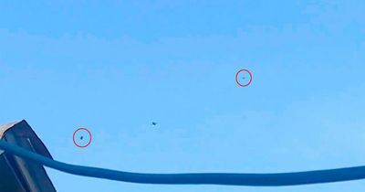 Russian fighter pilots eject from warplane moments before it's shot down by Ukrainians