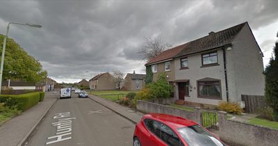 Man 'fighting for his life' in hospital after being found seriously injured on Scots street