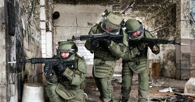 Horrifying images show dozens of 'battered bodies of Russian soldiers sent to die'