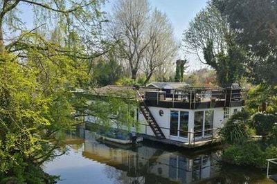 Extraordinary floating home on private island in River Thames listed for sale for £545,000