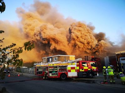 Large plume of smoke over town as fire crews tackle industrial unit blaze