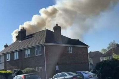 Man taken to hospital as firefighters tackle blaze at house in New Malden