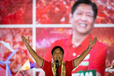 Philippines' Marcos hails 'genius' father as presidential election nears