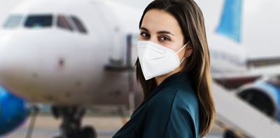 Want to cut your chance of catching COVID on a plane? Wear a mask and avoid business class