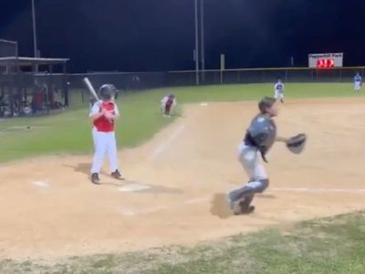 Video shows children running for cover as dozens of gunshots ring out at junior baseball game