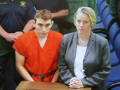 Parkland shooter Nikolas Cruz rushed to safety after potential juror mouths threats to him