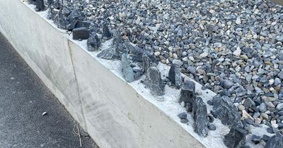 'Pain in the arse' Council slammed for 'jagged rocks' on wall overlooking river
