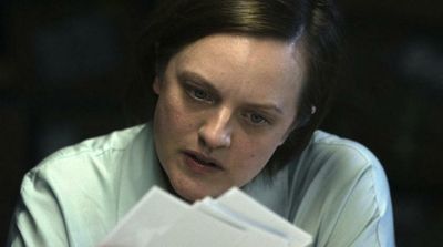 Battling the Odds: Elisabeth Moss Prefers a Dramatic Workday