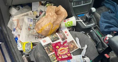 Police shame messy car filled with McDonald's, crisp packets and fizzy drinks cans