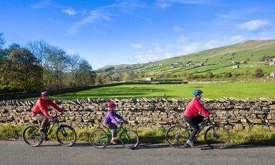 ‘Traffic-free lanes and beautiful views’: readers’ favourite UK family cycle routes