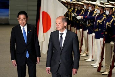 Japan PM says cannot accept status quo change by force anywhere