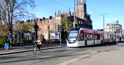 Edinburgh cyclist holds up Princes Street tram after altercation at red light