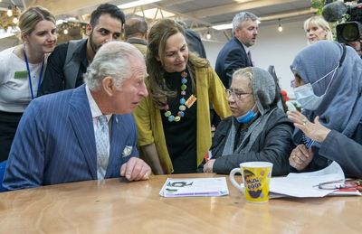 Charles expresses concern for asylum seekers during community centre visit