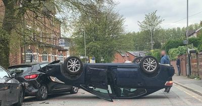Moment car flips over in middle of quiet Prestwich street after three car collision