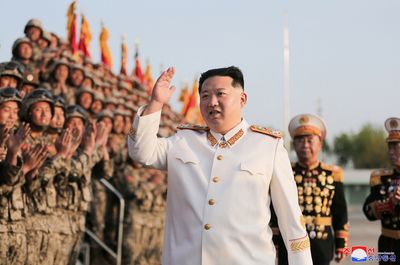 N.Korea's Kim calls for stronger military as nuclear test work 'well underway'