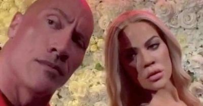 Khloe Kardashian reacts as Dwayne Johnson admires her wax bum at Madame Tussauds