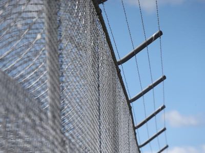 Dozens charged after wild Qld prison riot