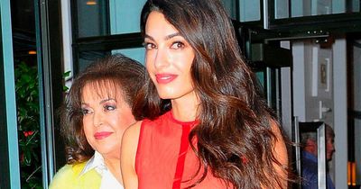 Amal Clooney sets pulses racing as she dines with her mum in stunning red dress