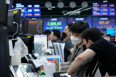 Asian shares jump as Chinese leaders pledge help for economy
